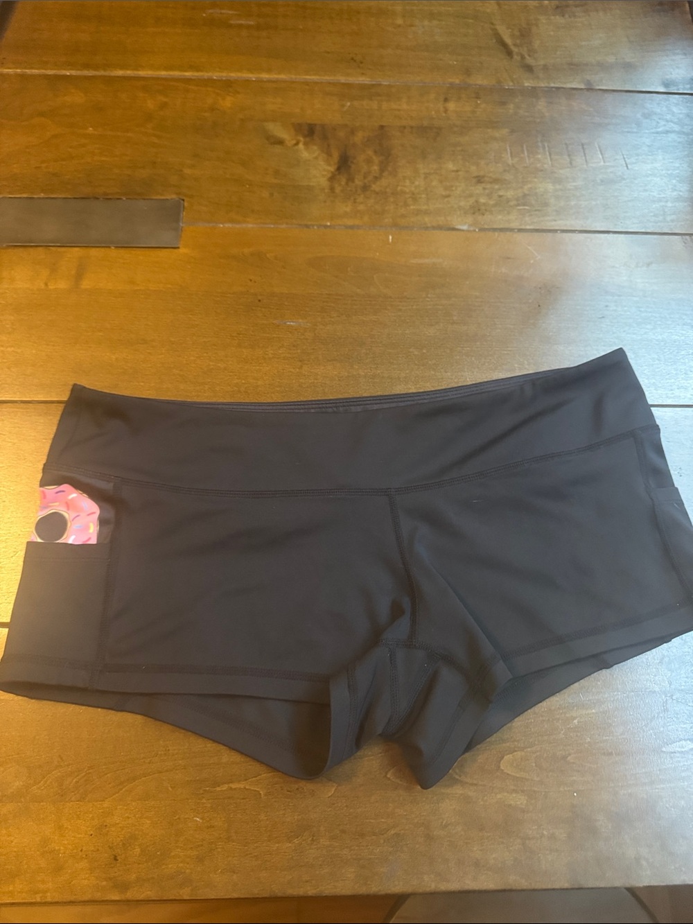 Feed Me Fight Me Black Bike Shorts with Pink Pocket Accent